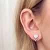 Orecchini cuore con borchie argento rosato - immagine 2